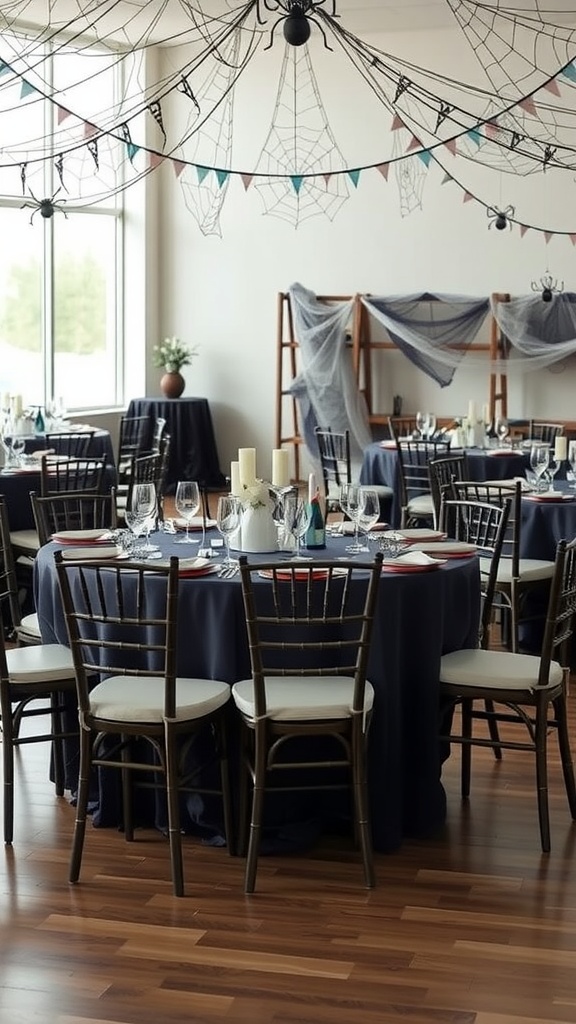 A spooky baby shower setup with spider web decorations, dark tablecloths, and elegant seating arrangements.