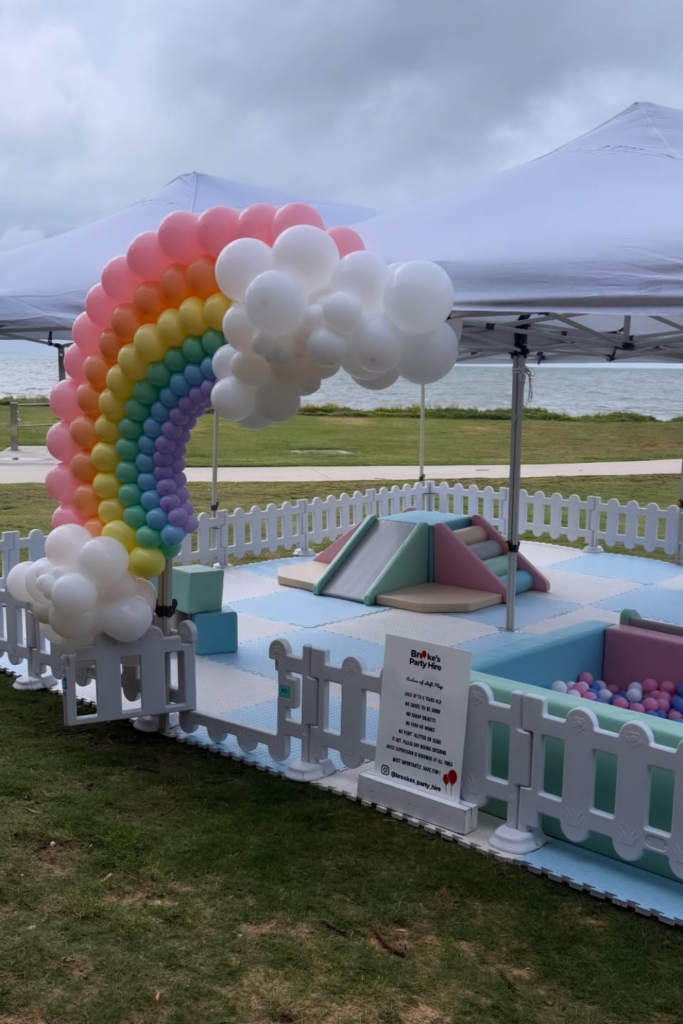 Rainbow outdoor play zone with slide and ball pit