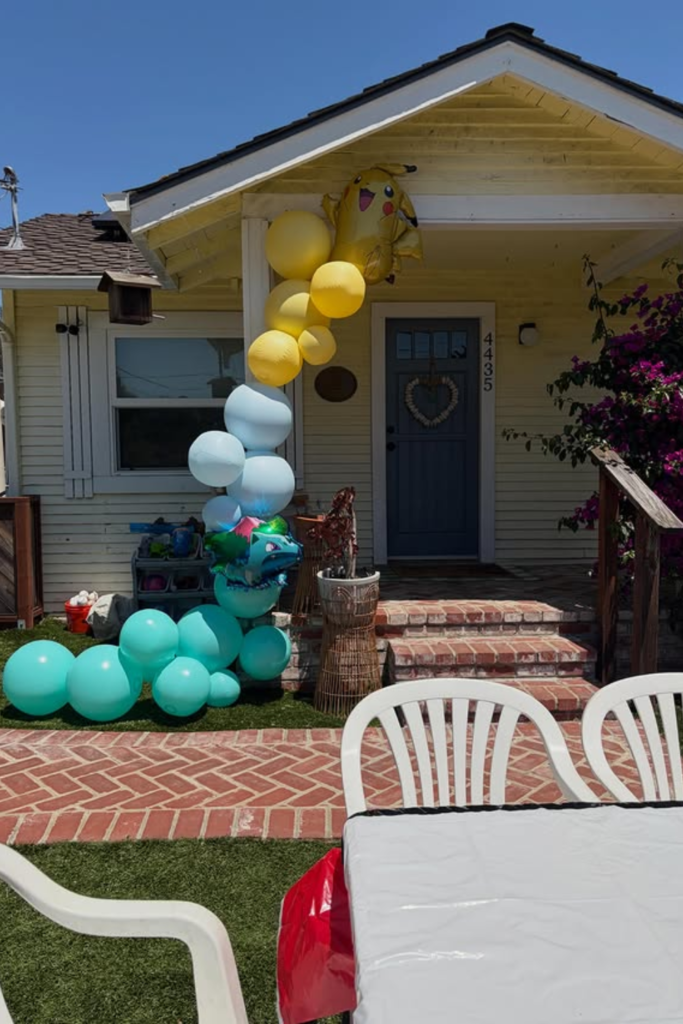 Pokemon birthday entrance with yellow and blue balloons