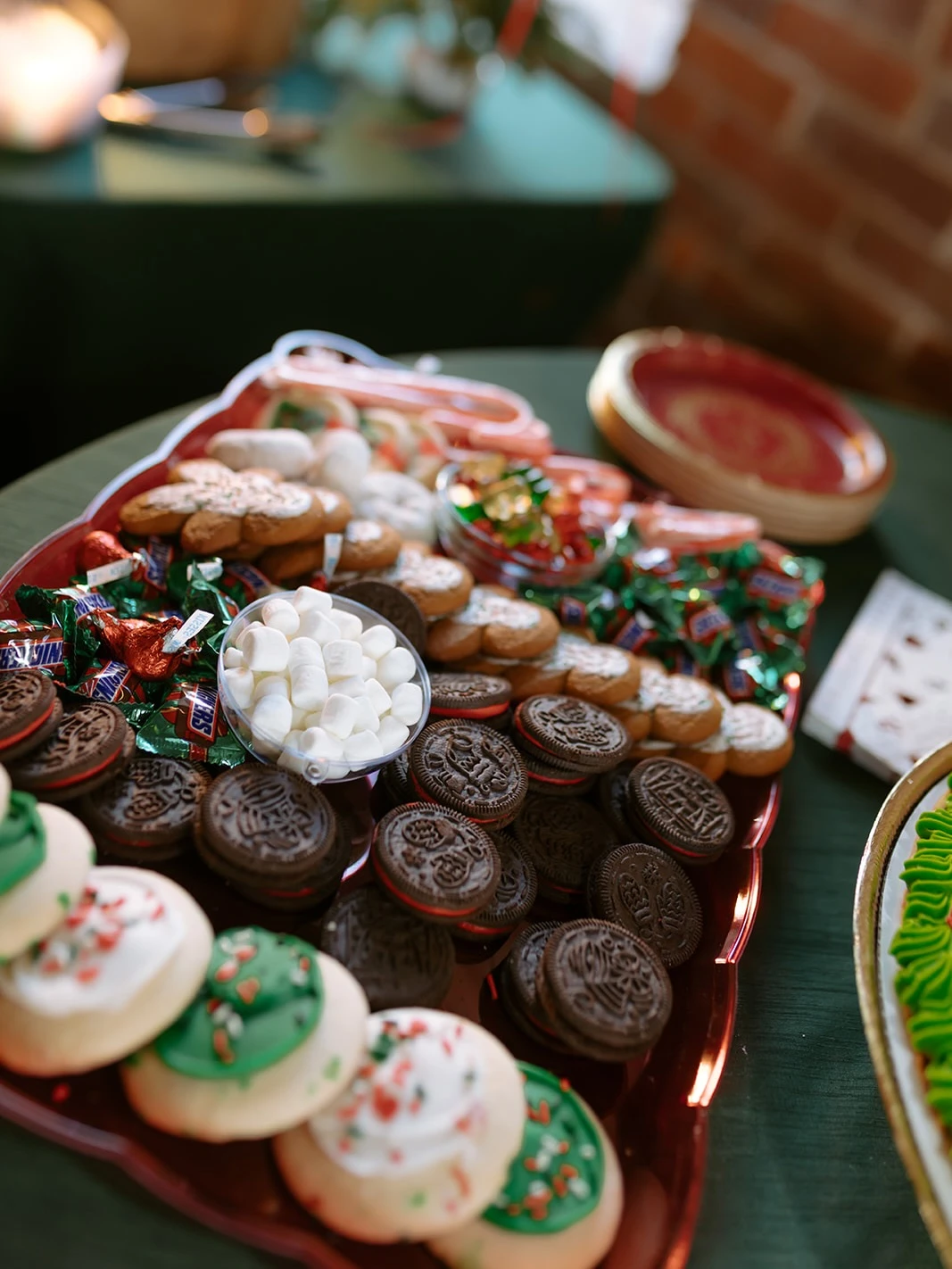 Festive royal icing sugar cookies shaped like Christmas trees, stockings, presents, and sweaters