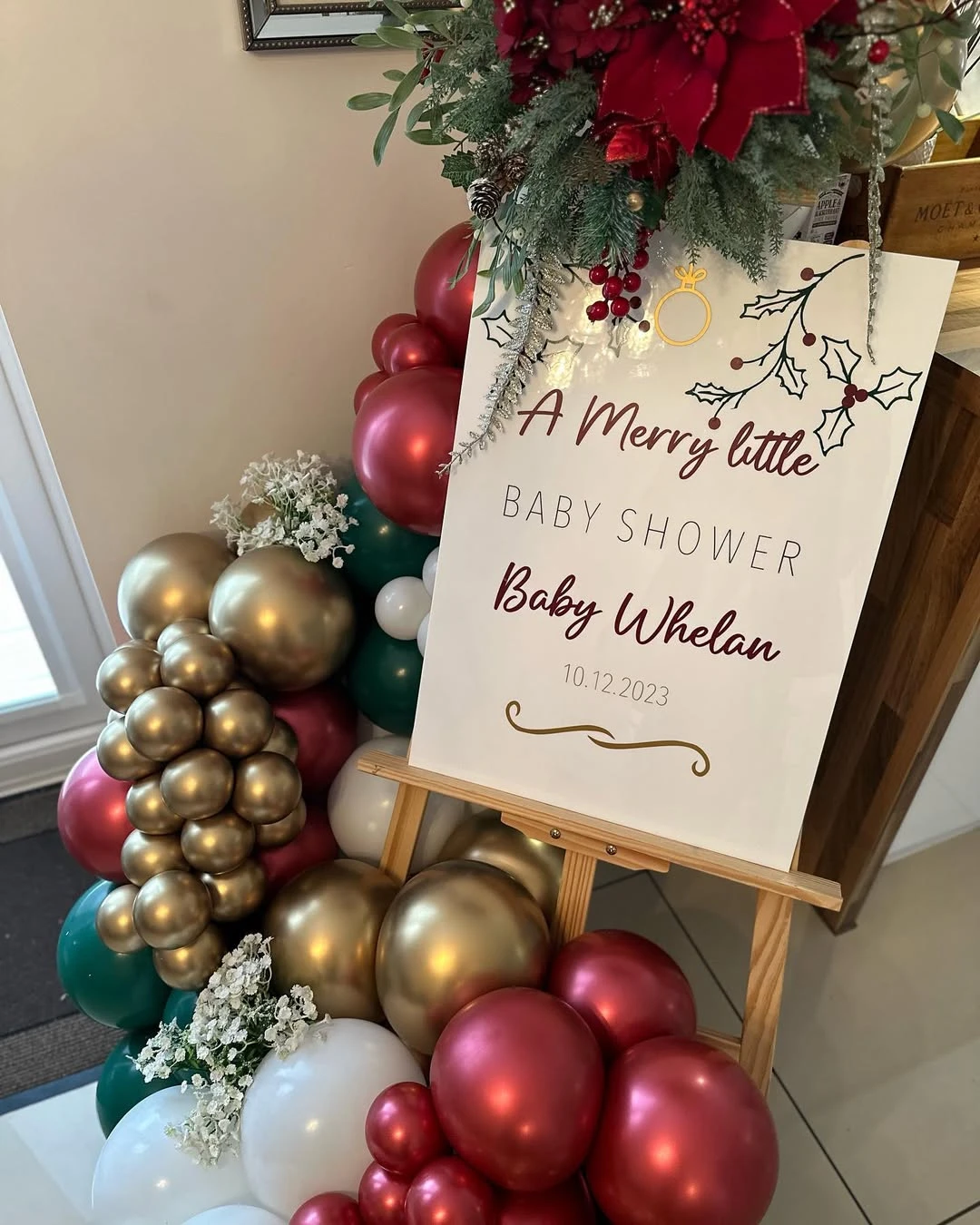 Festive welcome sign board for a merry little baby shower theme