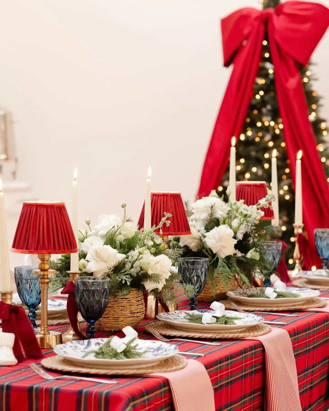 Festive balloon photo backdrop for a merry little baby shower