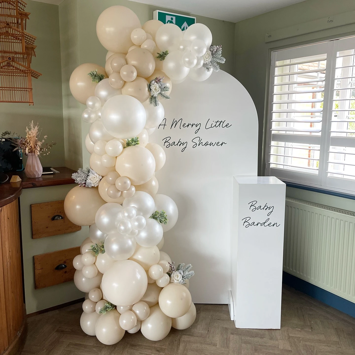 Ribbon topped Christmas tree focal point for a merry little baby shower