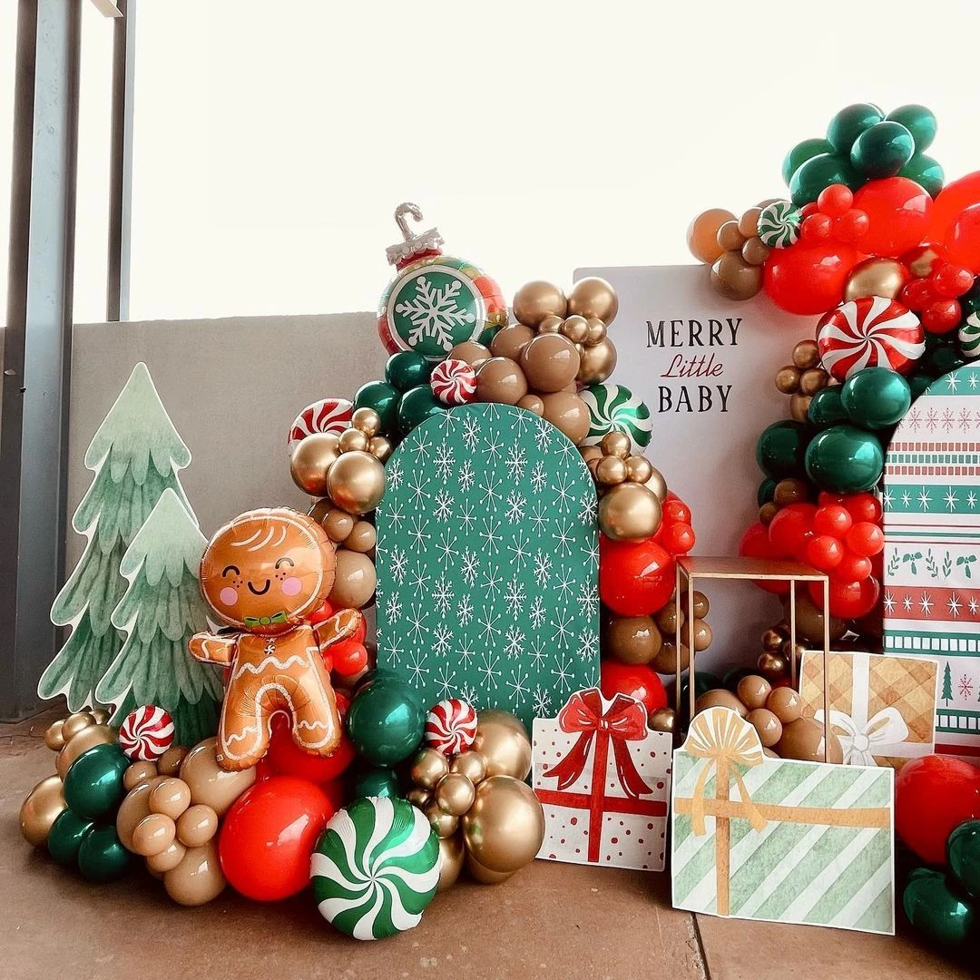 Flocked Christmas trees with red bow accents for a baby shower