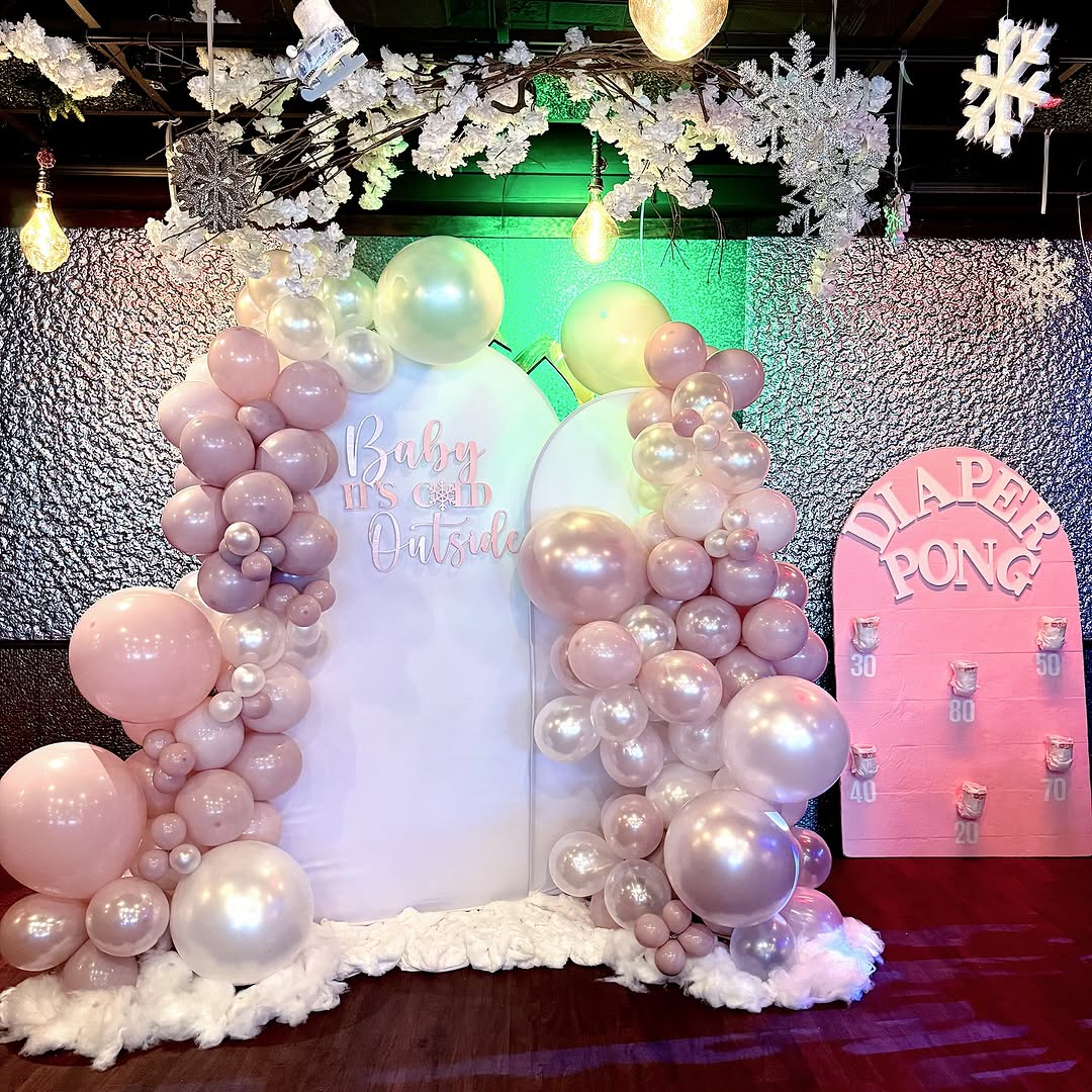 Pink Balloon Backdrop with Diaper Pong Game