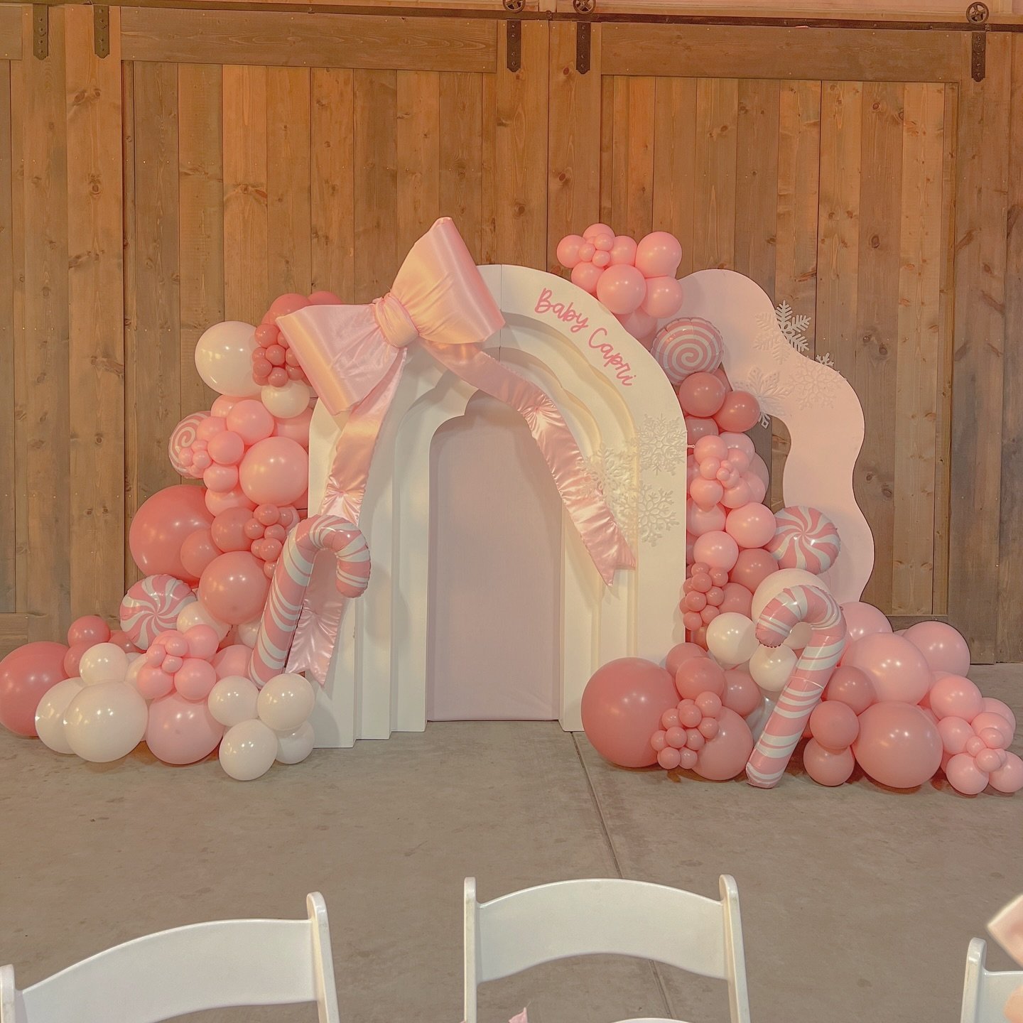 Pastel Pink Bow Arch and Candy Cane Backdrop